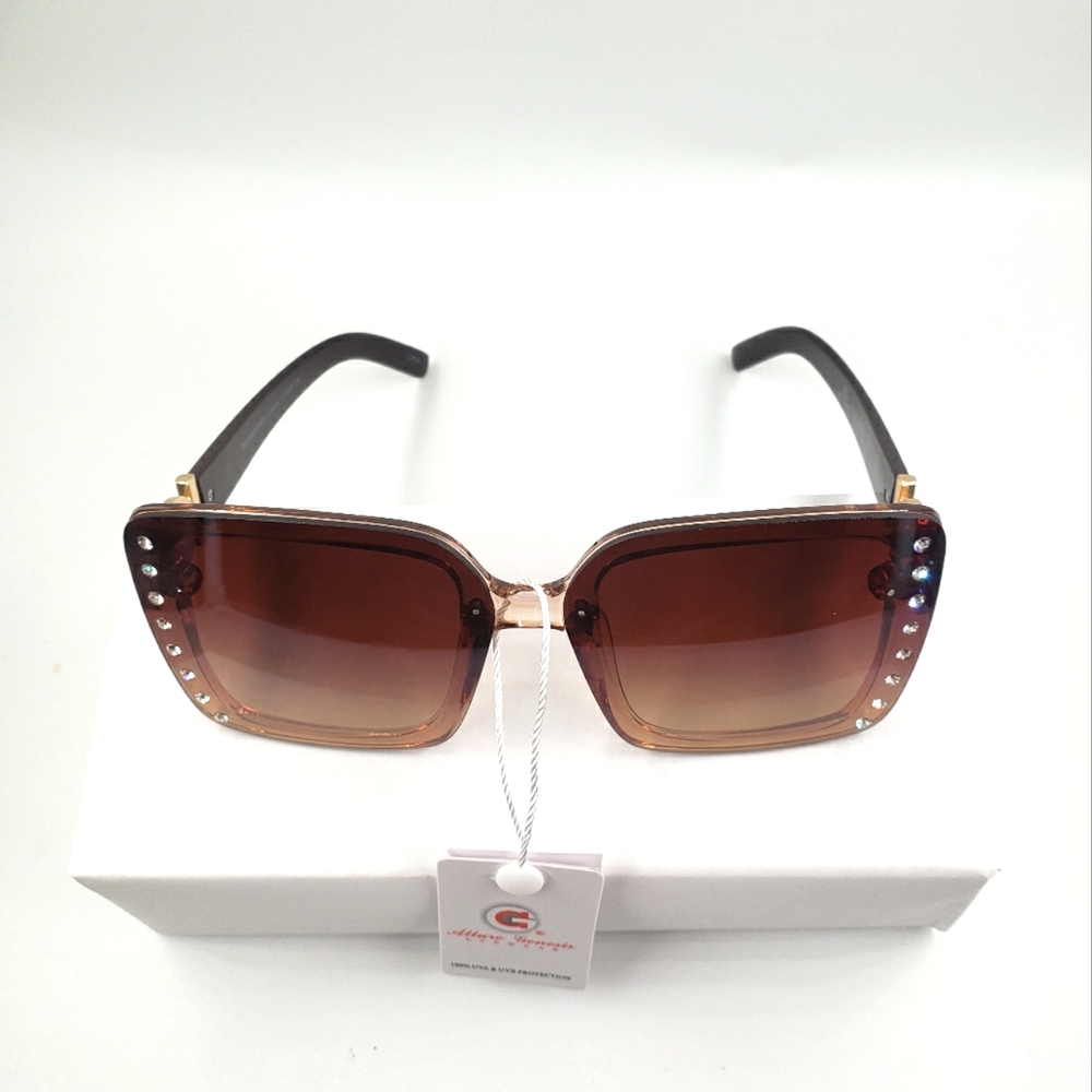 Women's brown rhinestone embellished sunglasses.